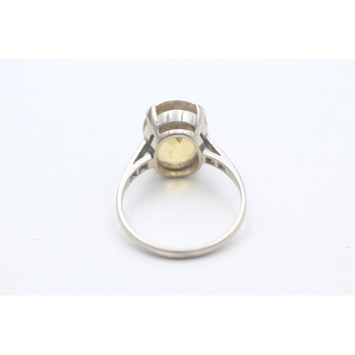 240 - 18ct white gold citrine single stone ring with diamond set shoulders (3.8g) - stone missing Size M