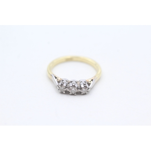 242 - 18ct gold diamond three stone ring (2.6g) Size J