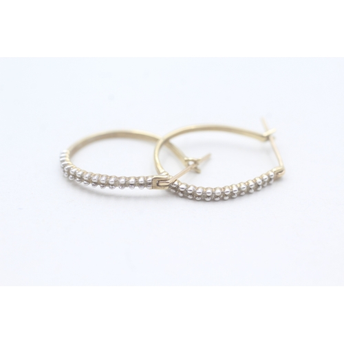 246 - 9ct gold diamond hoop earrings (1.6g)