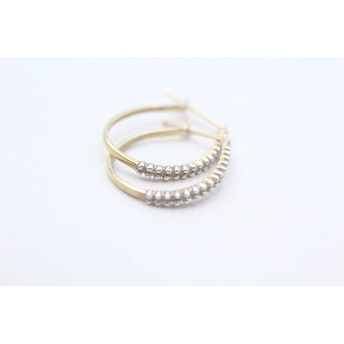 246 - 9ct gold diamond hoop earrings (1.6g)