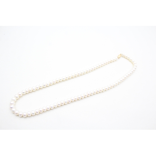 25 - 14ct gold cultured pearl necklace (31.7g)