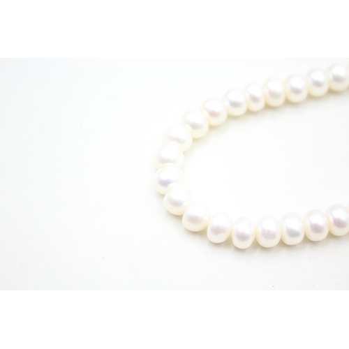 25 - 14ct gold cultured pearl necklace (31.7g)