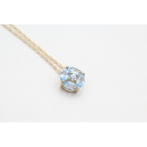 250 - 9ct gold vari-cut blue topaz pendant necklace (1.4g)