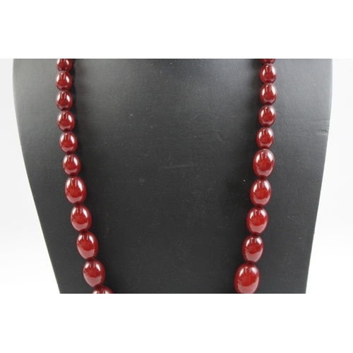 252 - Graduated Cherry Bakelite Necklace w/ Internal Streaking 53g