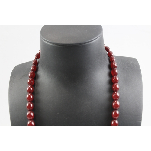 252 - Graduated Cherry Bakelite Necklace w/ Internal Streaking 53g