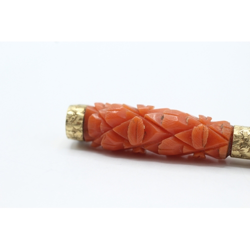 4 - 9ct gold carved coral brooch (10.4g)