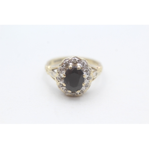 42 - 9ct gold sapphire and diamond halo ring (3.2g) Size K