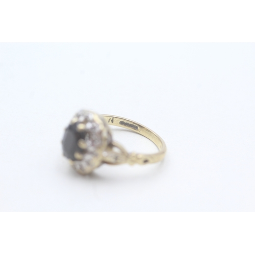 42 - 9ct gold sapphire and diamond halo ring (3.2g) Size K