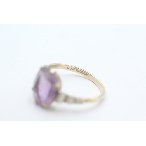 54 - 9ct gold amethyst set cocktail ring (2.5g) Size Q 1/2