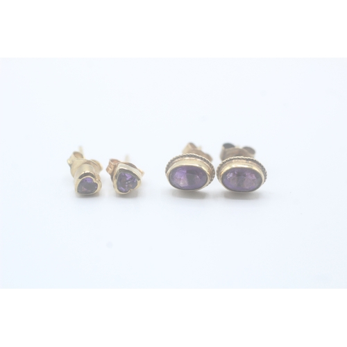 55 - 2x 9ct gold amethyst stud earrings (1.7g)