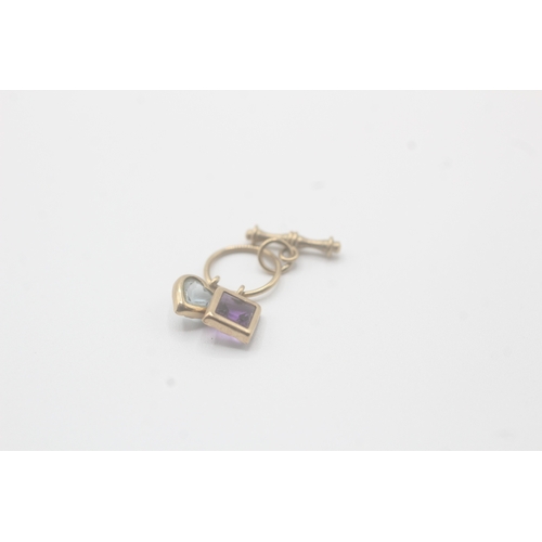 56 - 9ct gold blue topaz, amethyst & t-bar charm (0.8g)