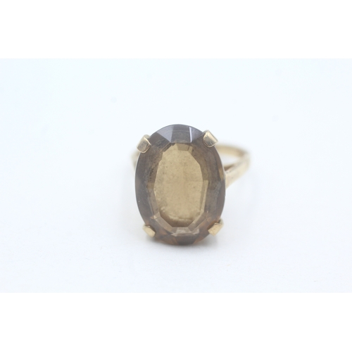 64 - 9ct gold smoky quartz cocktail ring (6.1g) Size N 1/2