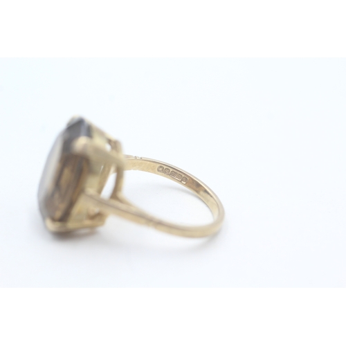 64 - 9ct gold smoky quartz cocktail ring (6.1g) Size N 1/2