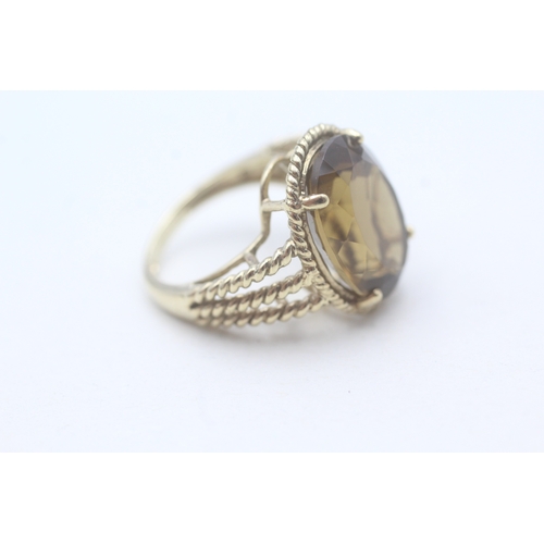 65 - 9ct gold citrine set cocktail ring (5.7g) Size K