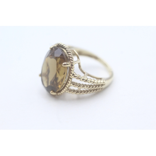 65 - 9ct gold citrine set cocktail ring (5.7g) Size K