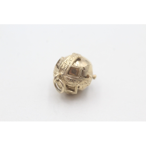 68 - 9ct gold & silver masonic ball charm (7g)