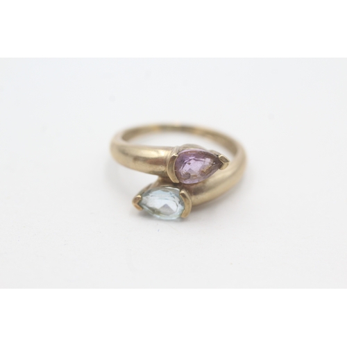 78 - 9ct gold topaz and amethyst twin stone ring (2.3g) Size N