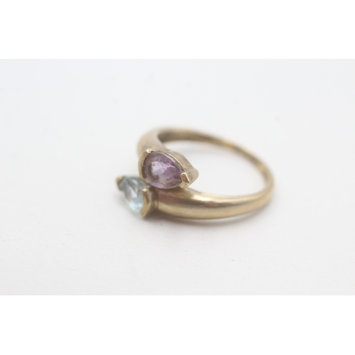 78 - 9ct gold topaz and amethyst twin stone ring (2.3g) Size N