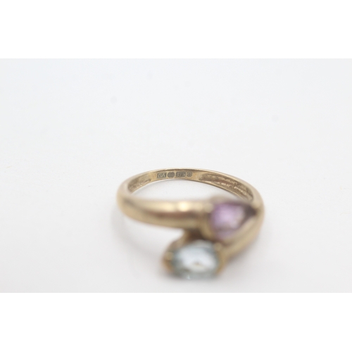 78 - 9ct gold topaz and amethyst twin stone ring (2.3g) Size N