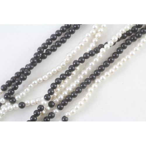 95 - 14ct gold onyx and cultured pearl beaded necklace (37.5g)