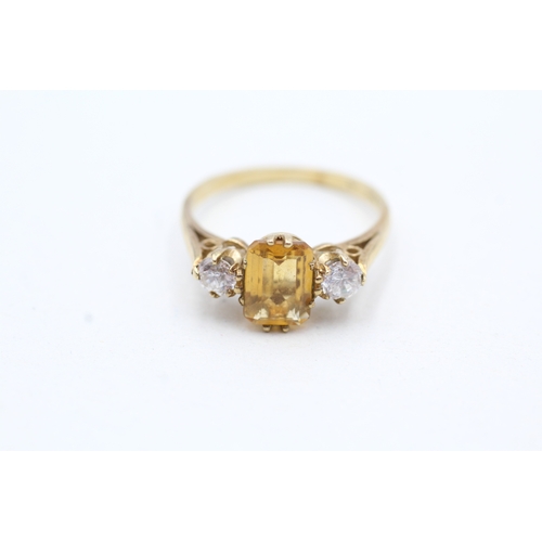 105 - 9ct gold citrine and white gemstone trilogy ring (2.5g) Size P