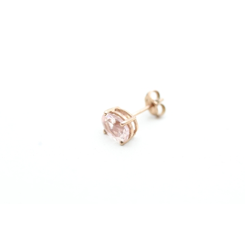 108 - 9ct gold oval cut pink gemstone stud earrings (1.2g)