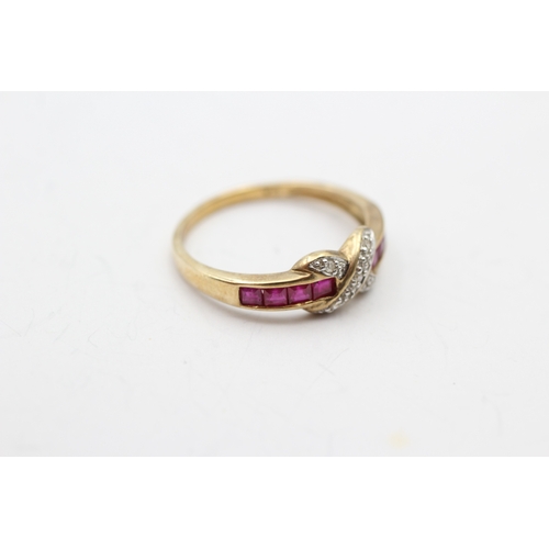 128 - 9ct gold ruby and diamond cross channel ring (1.9g) Size P 1/2