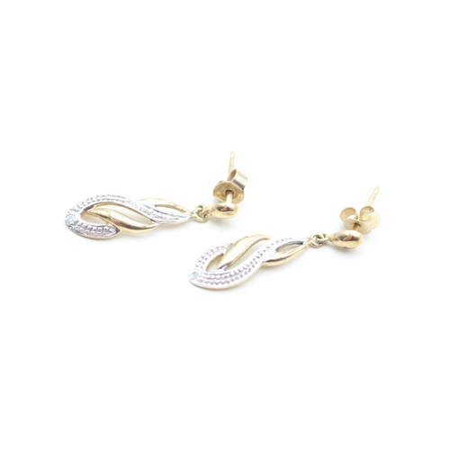 130 - 9ct gold diamond set drop earrings (1.7g)