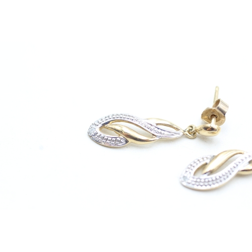 130 - 9ct gold diamond set drop earrings (1.7g)