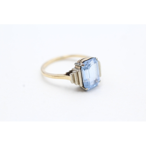 133 - 9ct gold blue gemstone single stone ring (2.9g) Size L 1/2