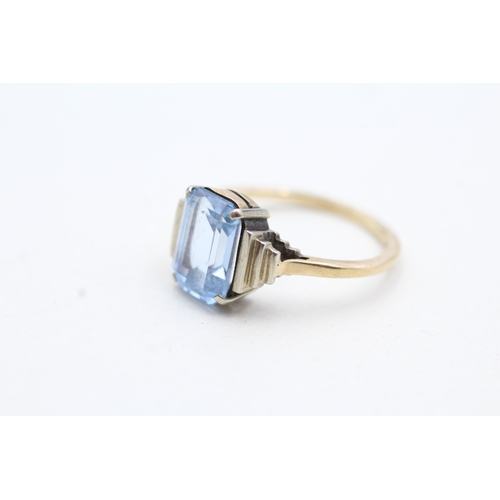 133 - 9ct gold blue gemstone single stone ring (2.9g) Size L 1/2