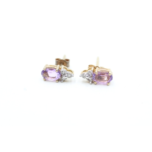 136 - 9ct gold amethyst and diamond set stud earrings (1g)