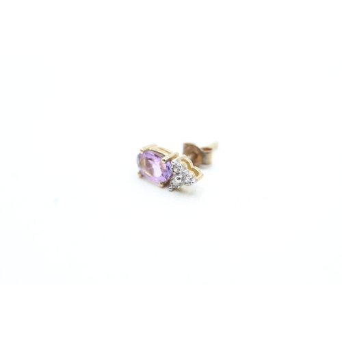 136 - 9ct gold amethyst and diamond set stud earrings (1g)