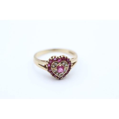 140 - 9ct gold ruby & diamond heart shape dress ring (2.9g) Size N