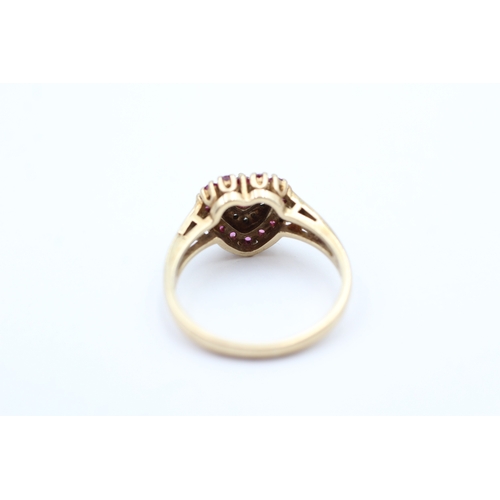 140 - 9ct gold ruby & diamond heart shape dress ring (2.9g) Size N