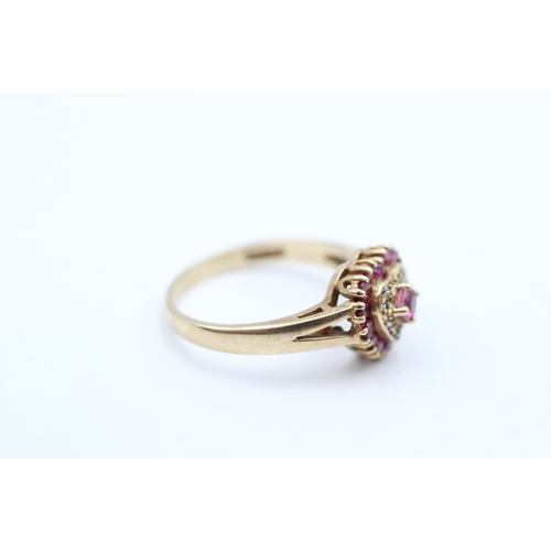 140 - 9ct gold ruby & diamond heart shape dress ring (2.9g) Size N