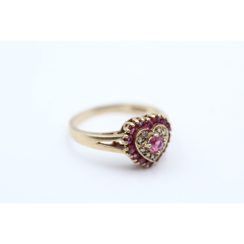 140 - 9ct gold ruby & diamond heart shape dress ring (2.9g) Size N