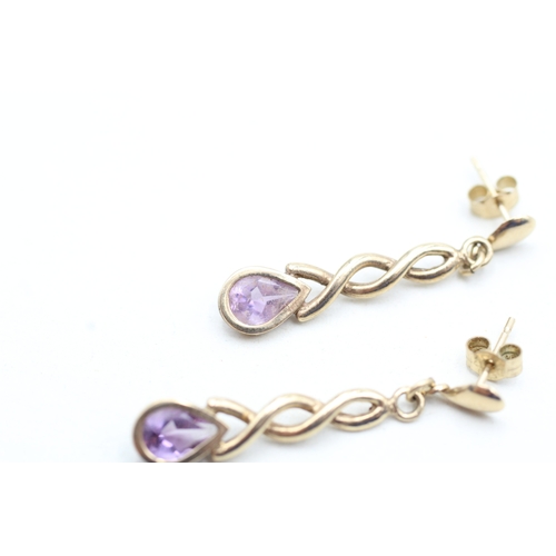 145 - 9ct gold pear cut amethyst drop earrings (1.7g)