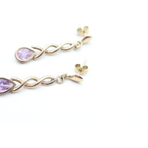 145 - 9ct gold pear cut amethyst drop earrings (1.7g)