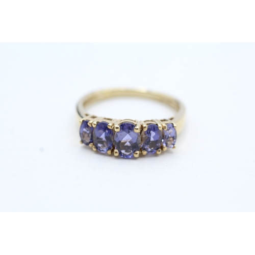 152 - 9ct gold iolite five stone ring (2.9g) Size S