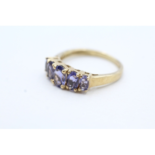 152 - 9ct gold iolite five stone ring (2.9g) Size S