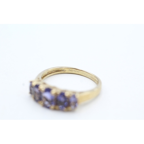 152 - 9ct gold iolite five stone ring (2.9g) Size S