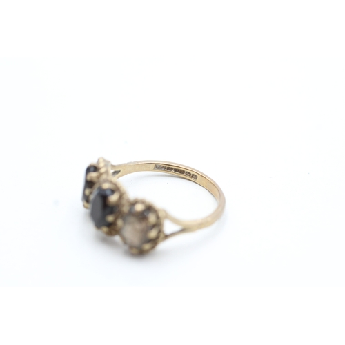 164 - 9ct gold vintage smokey quartz three stone ring (3.4g) Size O