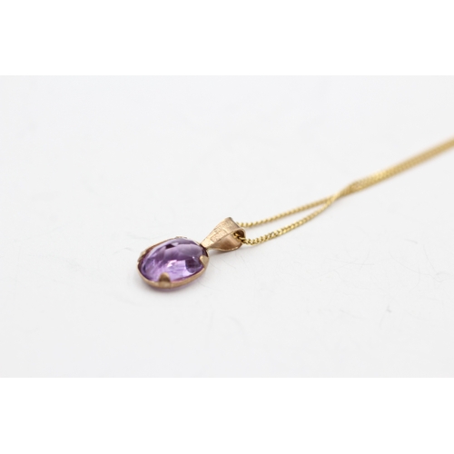 167 - 9ct gold amethyst single stone pendant on chain (1.2g)