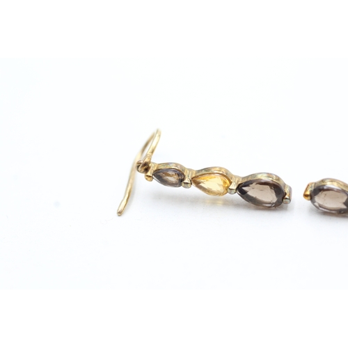 170 - 9ct gold pear cut smokey quartz, and citrine set static drop earrings (2.2g)