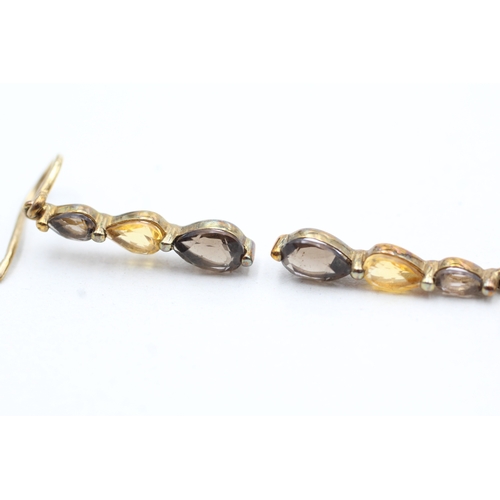 170 - 9ct gold pear cut smokey quartz, and citrine set static drop earrings (2.2g)