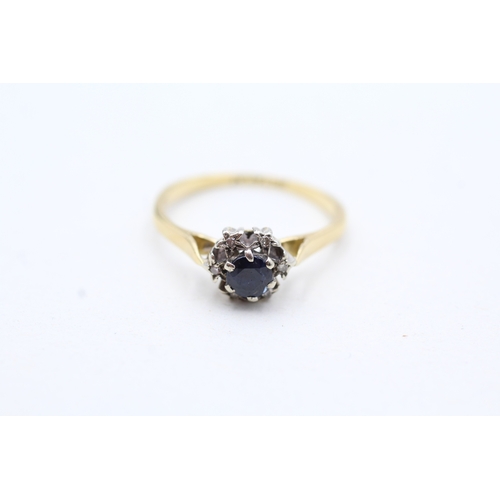 187 - 18ct gold sapphire and diamond halo ring (2.4g) Size L