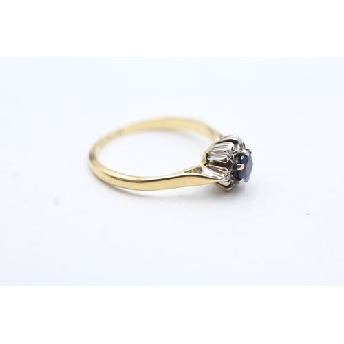 187 - 18ct gold sapphire and diamond halo ring (2.4g) Size L