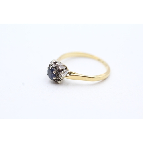 187 - 18ct gold sapphire and diamond halo ring (2.4g) Size L