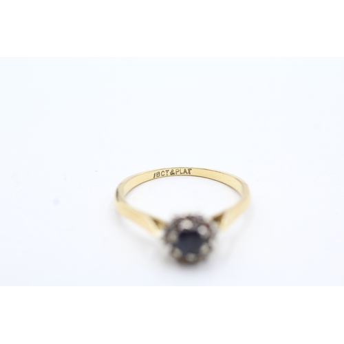 187 - 18ct gold sapphire and diamond halo ring (2.4g) Size L